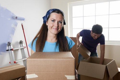 Careful loading of household items into a removal vehicle